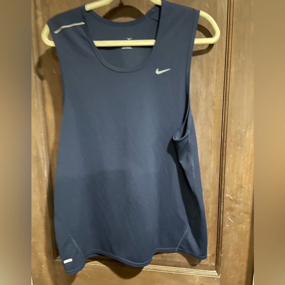 Womens Large Nike Dri Fit Sleeveless shirt. Navy in color.